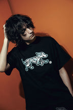 Remera Bossio x Tranca (Negro x Celeste)